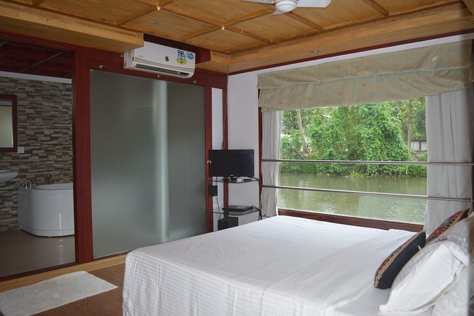 Private luxury Houseboat trip at Alleppy Backwaters. - The real value in $264.35 per group (up to 2)